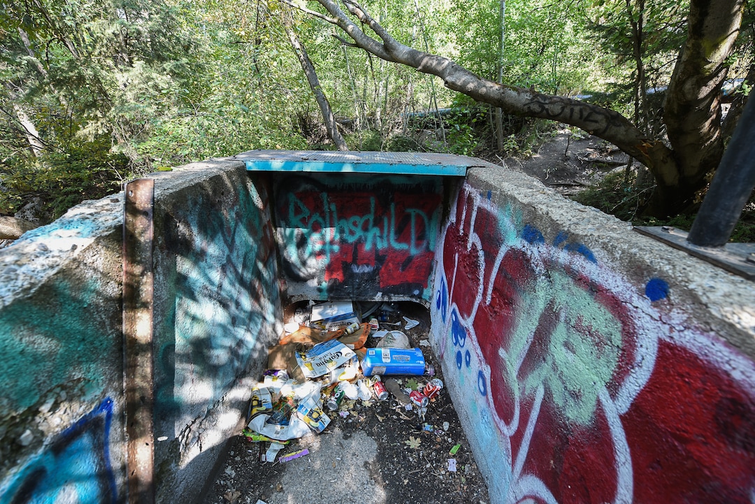 (Francisco Kjolseth  |  The Salt Lake Tribune)  Graffiti has proliferated in lower Little Cottonwood Canyon, where vandals, often wielding cans of florescent-colored spray paint, have covered granite faces, trees and structures. The vandalism is particularly apparent along the Temple Quarry Trail and the creek at the Moon Rock swimming hole and former pavilion site. Volunteers using donated equipment and solvents spend thousands of hours removing the paint from the rocks only to see graffiti return to the same faces or on rock nearby.