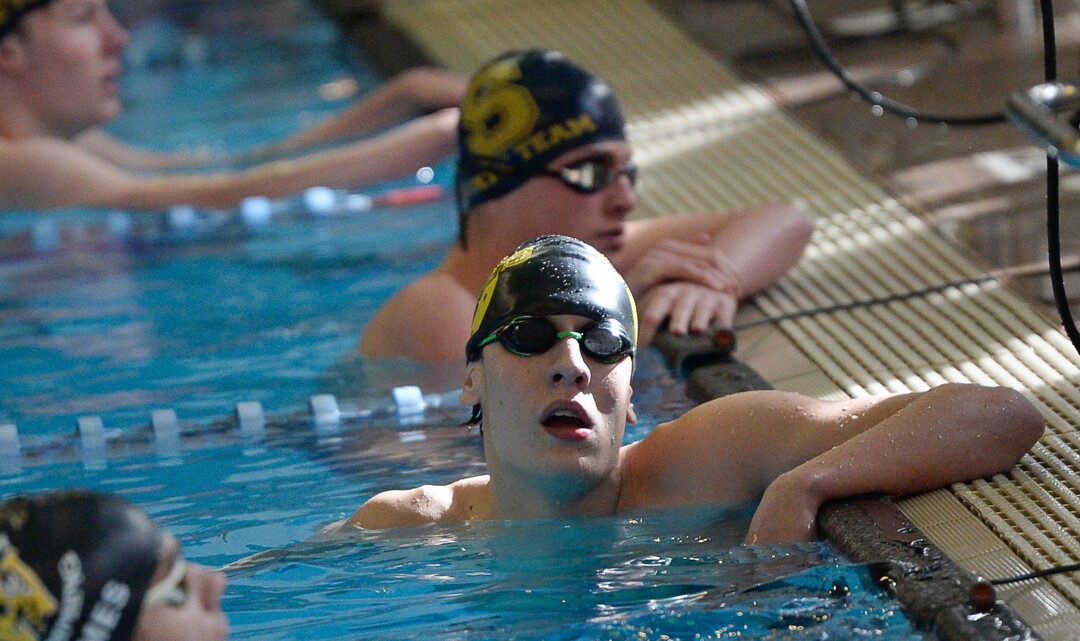 (Francisco Kjolseth  |  The Salt Lake Tribune)  Christian Simon of Cottonwood catches his breath after his first place win in the Men 50 Yard Free at the high school swimming 5A State Championships in Bountiful, Friday February 9, 2018.