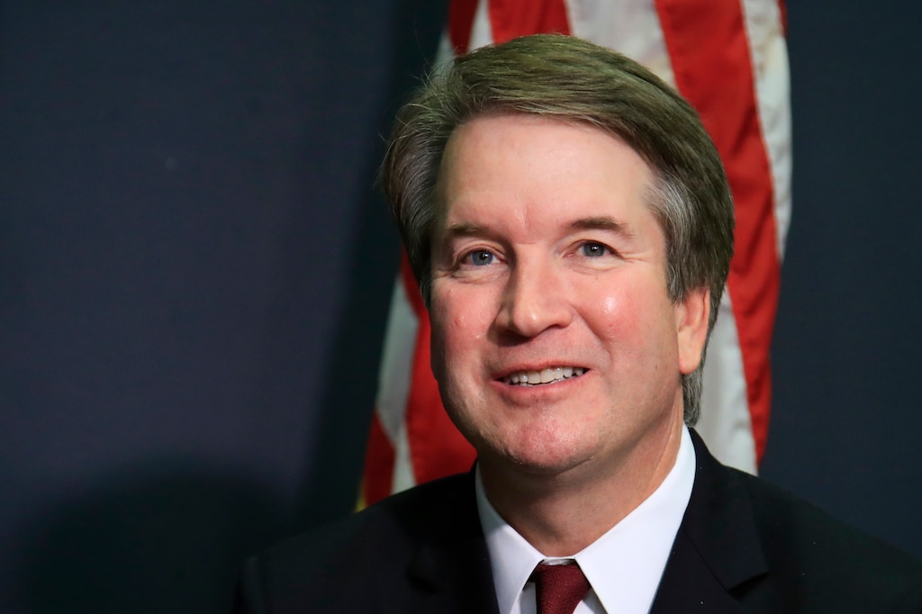 FILE - In this July 19, 2018, file photo, Supreme Court nominee Brett Kavanaugh glances at reporters during a meeting with Sen. James Lankford, R-Okla., on Capitol Hill in Washington. Kavanaugh has frequently supported giving the government wide latitude in the name of national security, including the secret collection of personal data from Americans. (AP Photo/Manuel Balce Ceneta, file)