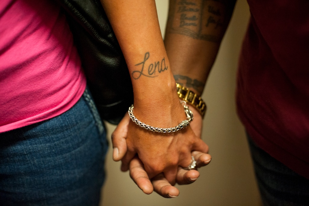 (Ty Wright | The New York Times) Lena Williams and Crystal Zimmer hold hands outside the Hamilton County Courthouse after being married in Cincinnati, Ohio, on June 26, 2015. State efforts to urge the Supreme Court to reconsider same-sex marriage have not advanced, but they have reopened the issue. 