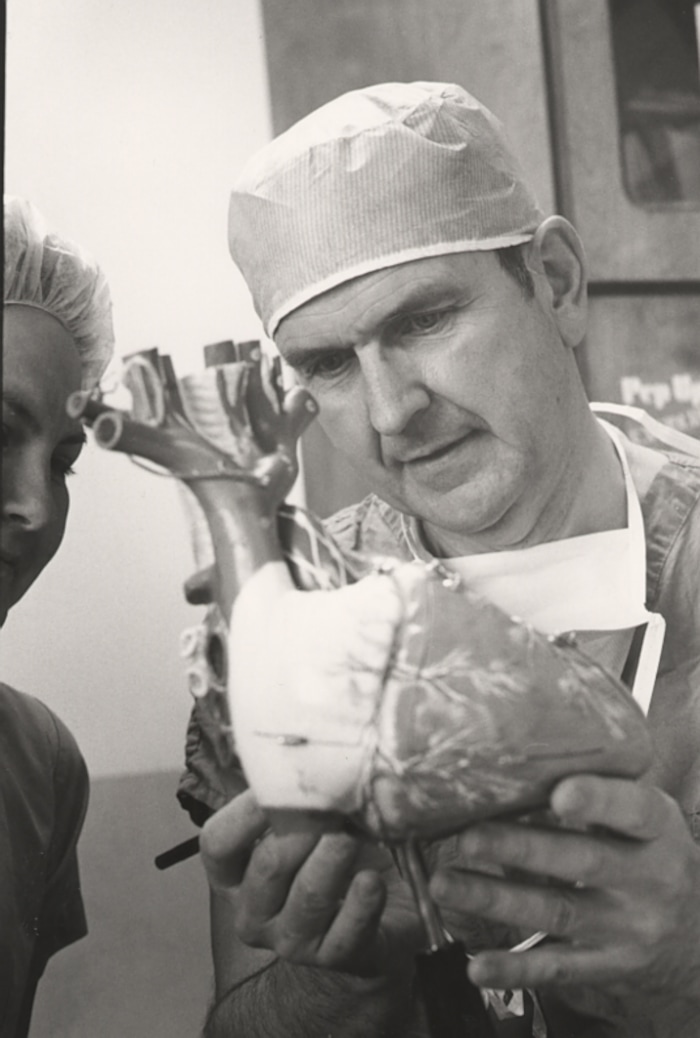 (The Church of Jesus Christ of Latter-day Saints) Russell M. Nelson examining a model of a heart.