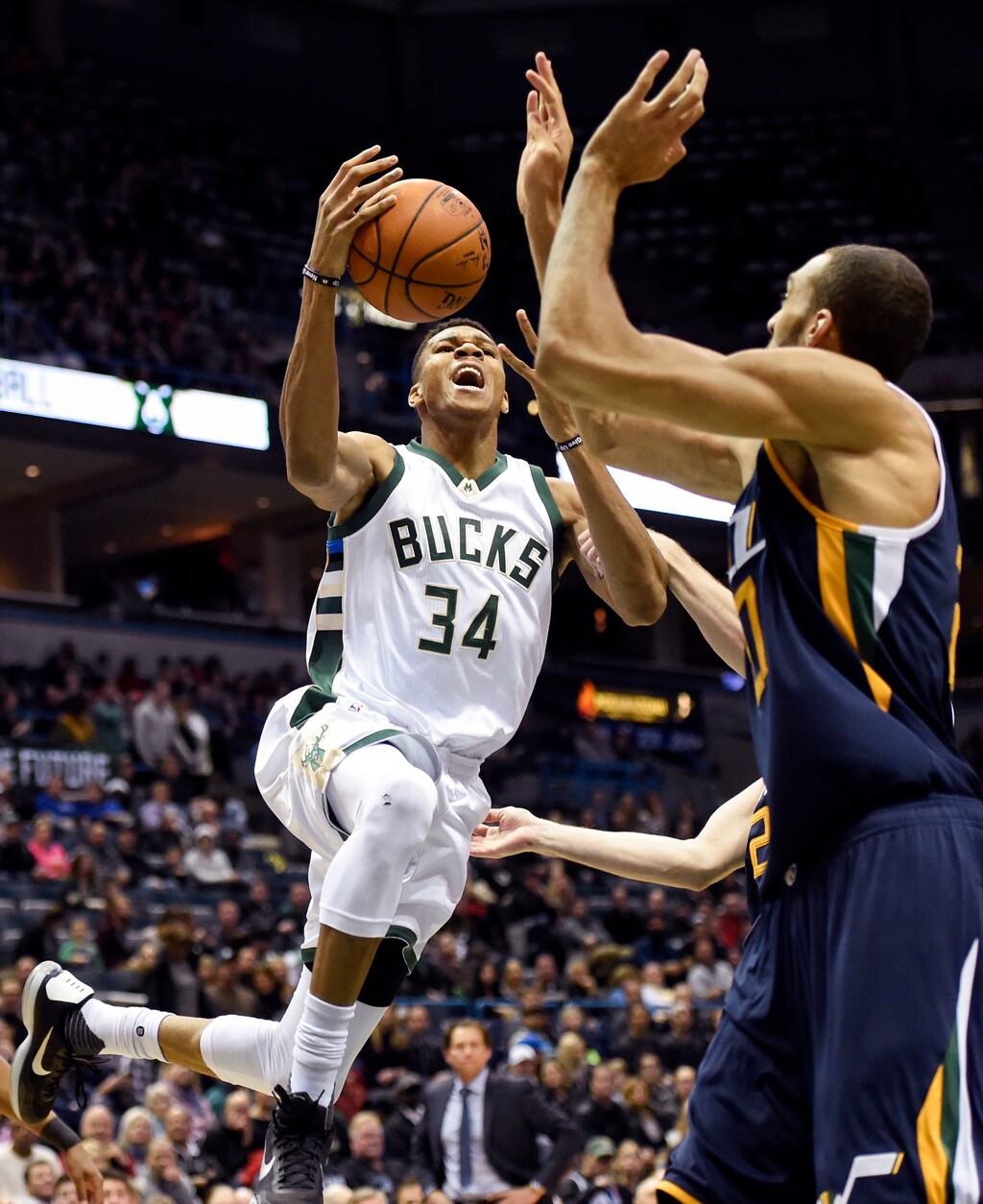 Milwaukee's Giannis Antetokounmpo (34) shoots against the Utah Jazz during their game last season in Milwaukee. (AP Photo/Benny Sieu)