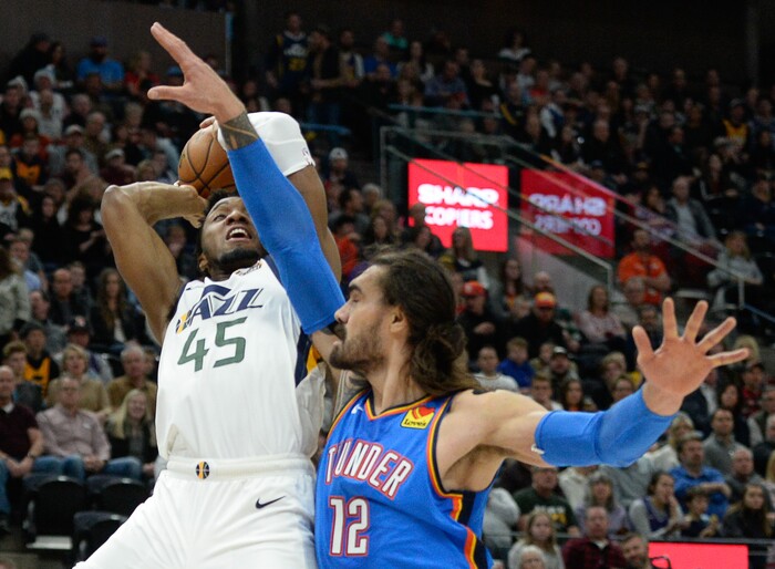 (Francisco Kjolseth  |  The Salt Lake Tribune)  Utah Jazz guard Donovan Mitchell (45) faces big man Oklahoma City Thunder center Steven Adams (12) as the Utah Jazz host the Oklahoma City Thunder in their NBA basketball game at Vivint Smart Home Arena in Salt Lake City on Mon. Dec. 9, 2019.