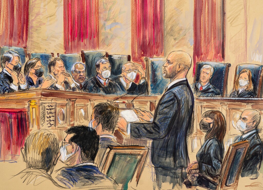 (Dana Verkouteren) This artist sketch depicts lawyer Scott Keller standing to argue on behalf of more than two dozen business groups seeking an immediate order from the Supreme Court to halt a Biden administration order to impose a vaccine-or-testing requirement on the nation's large employers during the COVID-19 pandemic, at the Supreme Court in Washington, Jan. 7, 2022.