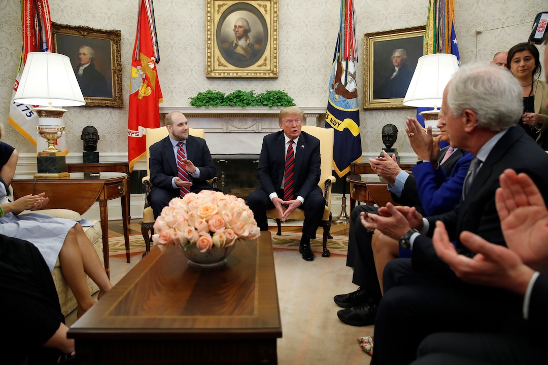 President Donald Trump, second from right, speaks as he sits with Joshua Holt, left who was recently released from a prison in Venezuela, with Sen. Bob Corker, R-Tenn., right, and others, in the Oval Office of the White House, Saturday, May 26, 2018, in Washington. (AP Photo/Alex Brandon)