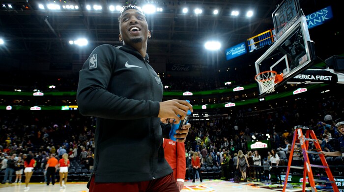 (Steve Griffin  |  The Salt Lake Tribune) Utah Jazz guard Donovan Mitchell (45) is all smiles as he leaves the court following a victory over the Golden State Warriors at Vivint Smart Home Arena in Salt Lake City Tuesday January 30, 2018.