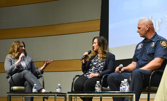(Francisco Kjolseth | The Salt Lake Tribune) Tribune Editor Jennifer Napier-Pearce, left, moderates a conversation with police officers and firefighters about mental health at the Salt Lake Public Library on Thursday, May 24, 2018. Included are Shante Johnson, spokeswoman for the Utah State Lodge Fop (Fraternal Order of Police) and the widow of Sgt. Derek Johnson, who was killed in the line of duty and Salt Lake City Fire Capt. Mike Stevens, an advocate for better mental health care for firefighters.