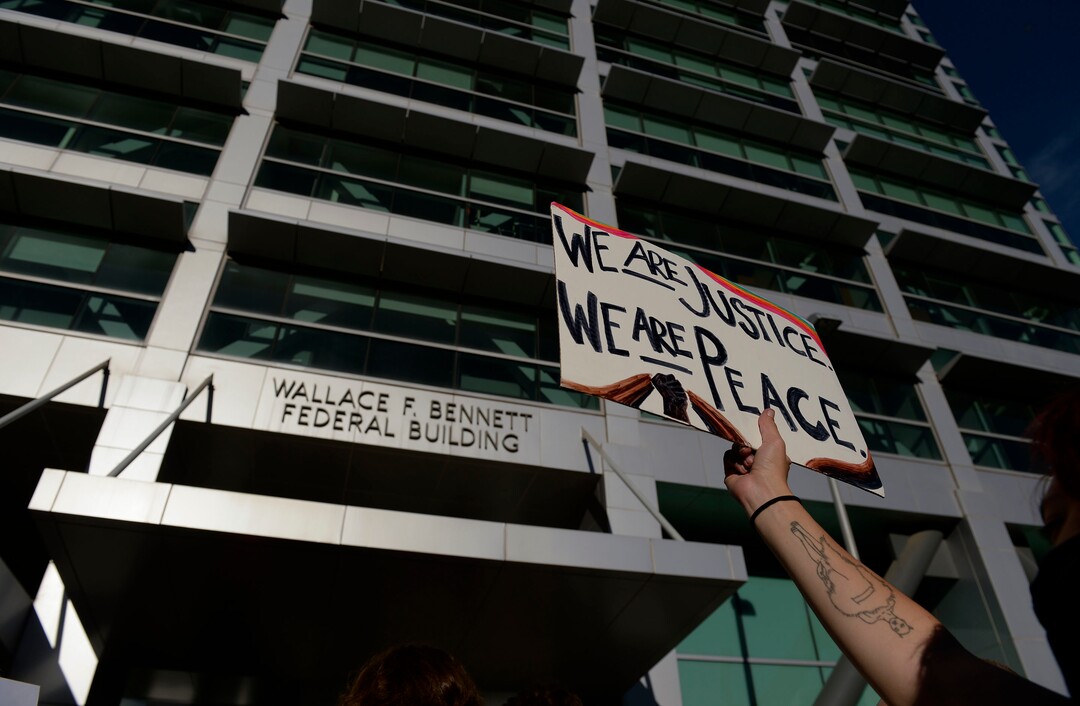 (Leah Hogsten  |  The Salt Lake Tribune) The Party for Socialism and Liberation Salt Lake joined Salt Lake Equal Rights Movement at the Wallace Bennett Federal Building in solidarity with the Black Lives Matter movement, June 9, 2020. 