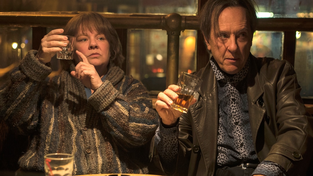 This image released by Fox Searchlight Films shows Melissa McCarthy, left, and Richard E. Grant in a scene from "Can You Ever Forgive Me?" (Mary Cybulski/Fox Searchlight via AP)