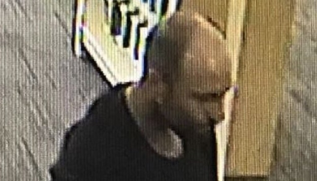 (Photo courtesy Salt Lake Police Department) Police are looking for this man, who they say is a person of interest in a carjacking.
