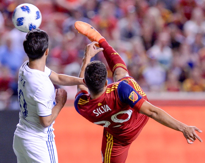 Leah Hogsten | The Salt Lake Tribune Real Salt Lake midfielder Luis Silva (20) attempts a goal with a bicycle kick nest to San Jose Earthquakes midfielder Jahmir Hyka (10) as Real Salt Lake hosts the San Jose Earthquakes at Rio Tinto Stadium in Sandy, Utah, Saturday, June 23, 2018.