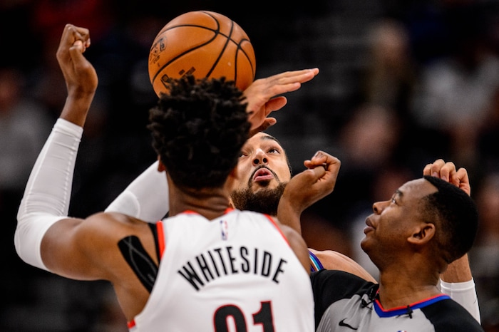 (Trent Nelson  |  The Salt Lake Tribune) Utah Jazz center Rudy Gobert (27) and Portland Trail Blazers center Hassan Whiteside (21) as the Utah Jazz host the Portland Trail Blazers, NBA basketball in Salt Lake City on Thursday, Dec. 26, 2019.