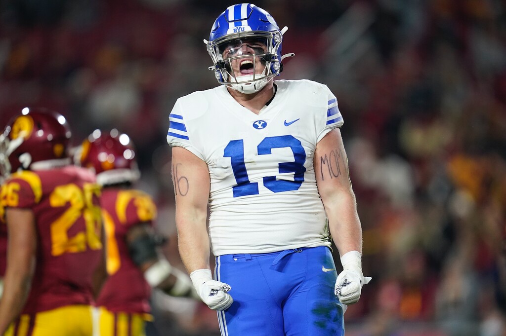 (Ashley Landis | The Associated Press) BYU tight end Masen Wake (13) celebrates after running for a first down during the first half of an NCAA college football game against Southern California in Los Angeles, Saturday, Nov. 27, 2021.
