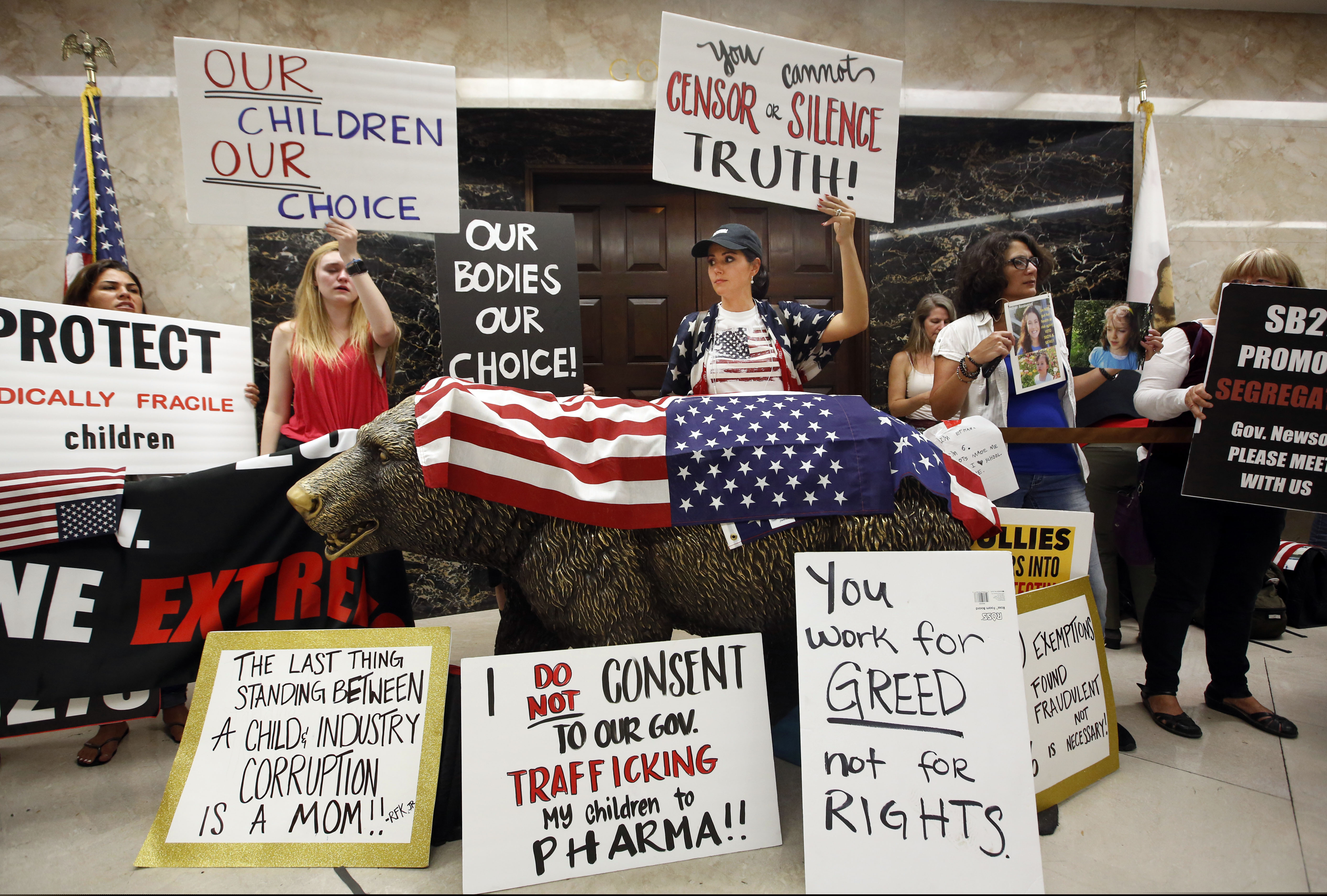 (Rich Pedroncelli | AP photo)

In this Sept. 9, 2019, photo, opponents of legislation to tighten the rules on giving exemptions for vaccinations, demonstrate outside the office of California Gov. Gavin Newsom in Sacramento, Calif.