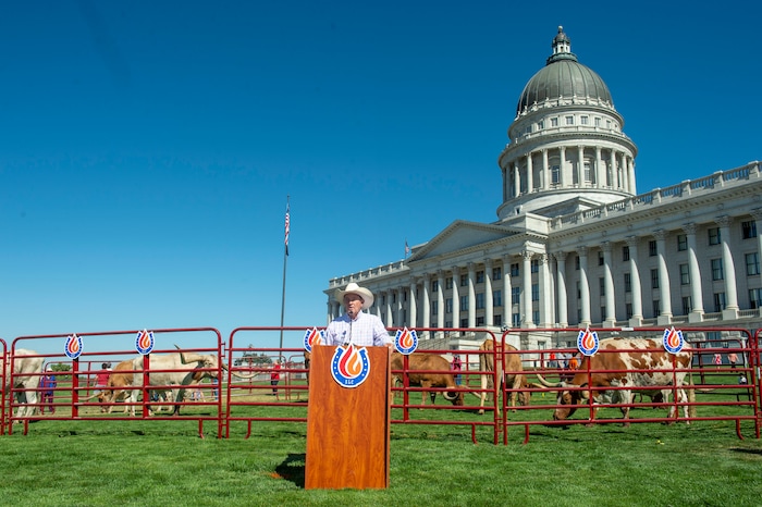 (Rick Egan  |  The Salt Lake Tribune)       Gov. Herbert speaks at a news conference about the Days of 47 festivities, on the State Capitol lawn with longhorn cattle in the background, Tuesday, July 16, 2019.
