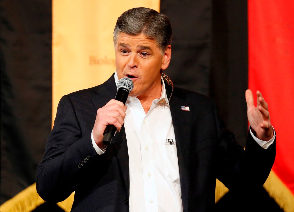 (Rick Scuteri | The Associated Press) In this March 18, 2016, file photo, Fox News Channel's Sean Hannity speaks during a campaign rally for Republican presidential candidate Sen. Ted Cruz, R-Texas, in Phoenix. The Fox News Channel host  is vowing to continue his attacks on ABC late-night comic Jimmy Kimmel until Kimmel apologizes for a segment in which he joked about first lady Melania Trump's accent. The dispute between the television personalities is unusually vitriolic, with Hannity calling Kimmel a "sick, twisted, creepy, perverted weirdo" during his Fox show on Friday, April 6, 2018.