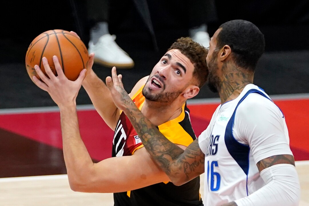 (Rick Egan | The Salt Lake Tribune)  Utah Jazz forward Georges Niang (31) goes up for a shot as Dallas Mavericks forward James Johnson (16) defends, in NBA action between the Utah Jazz and the Dallas Mavericks at Vivint Arena, on Friday, Jan. 29, 2021.