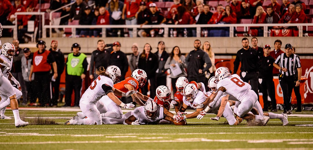 (Trent Nelson | The Salt Lake Tribune)  Utah and Stanford players dive for an onside kick in the final minute as the University of Utah hosts Stanford, NCAA football at Rice-Eccles Stadium in Salt Lake City Saturday October 7, 2017.