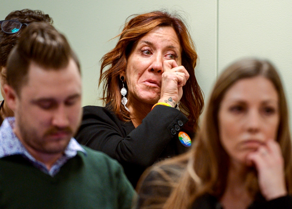 (Leah Hogsten | The Salt Lake Tribune) Taryn Hiatt, Utah and Nevada chapter director with the American Foundation for Suicide Prevention, wipes away tears as members of the House Judiciary Committee opt to modify the conversion therapy bill. Rep. Craig Hall, R-West Valley City, watched his colleagues dismantle his bill to end conversion therapy and replace it with an alternative that he says would do nothing to stop the widely-discredited practice of trying to change the sexual orientation or gender identity of LGBTQ youth during the House Judiciary Committee on Tuesday. The committee opted to go with the fourth substitute, which the majority of members said would strike a balance between allowing therapists to speak freely and protecting LGBTQ youth.