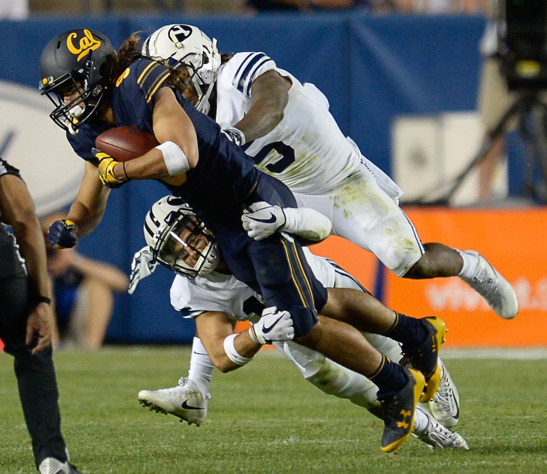 (Francisco Kjolseth  |  The Salt Lake Tribune)  California Golden Bears wide receiver Kanawai Noa (9) gets taken down by the BYU defense during the second half of the NCAA college football game, Saturday, Sept. 8, 2018, at LaVell Edwards stadium in Provo, Utah.