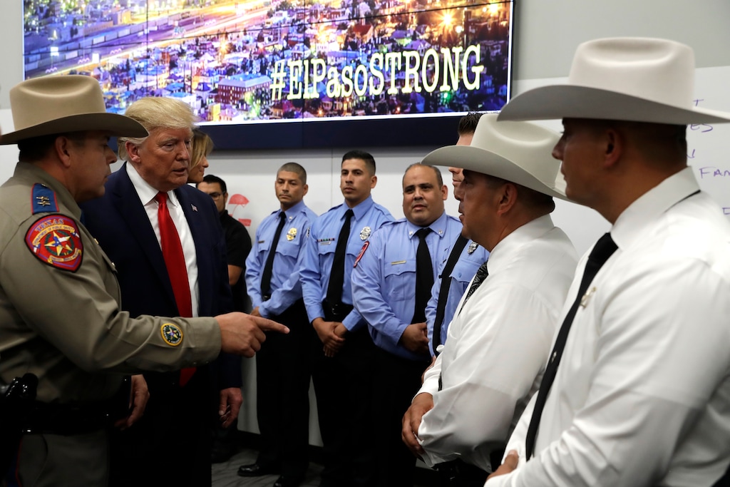 (Evan Vucci | AP Photo) President Donald Trump speaks to first responders as he visits the El Paso Regional Communications Center after meeting with people affected by the El Paso mass shooting, Wednesday, Aug. 7, 2019, in El Paso, Texas.