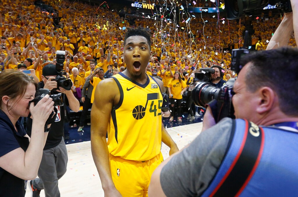 Utah Jazz guard Donovan Mitchell (45) celebrates after the team's 96-91 victory over the Oklahoma City Thunder during Game 6 of an NBA basketball first-round playoff series Friday, April 27, 2018, in Salt Lake City. The Jazz won the series. (AP Photo/Rick Bowmer)