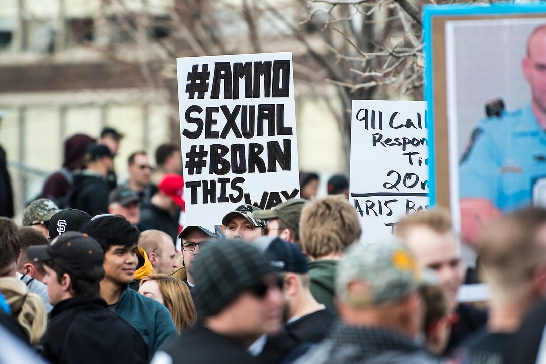 (Chris Detrick | The Salt Lake Tribune)  Participants hold signs during the March Before Our Lives rally near West High School in Salt Lake City Saturday, March 24, 2018.