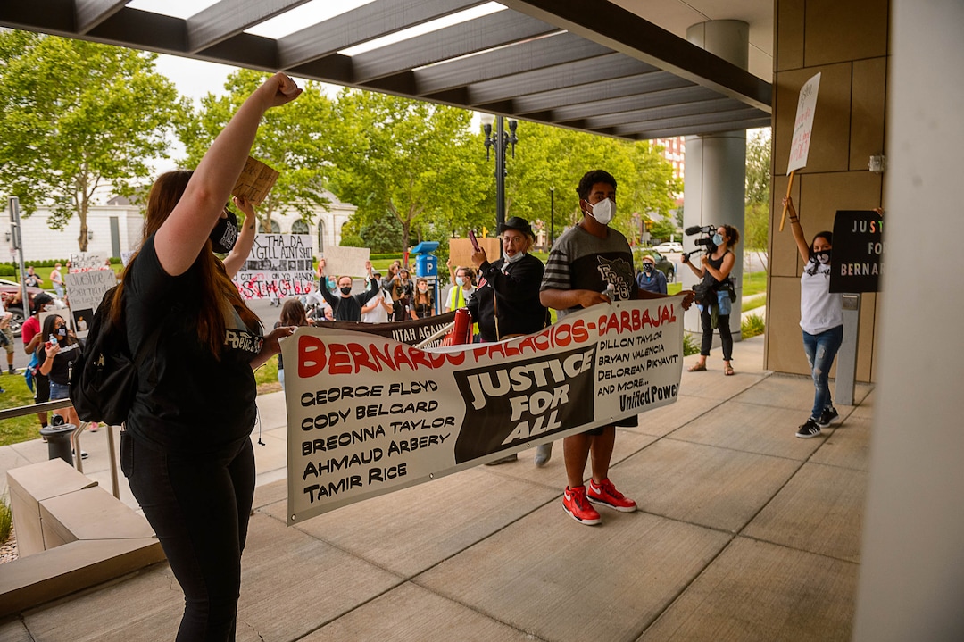 (Trent Nelson  |  The Salt Lake Tribune) People gather at the Salt Lake County District Attorney's office to protest against police brutality in Salt Lake City on Saturday, June 13, 2020.