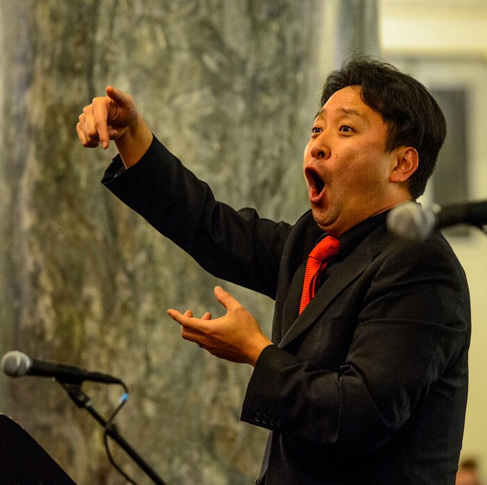 (Steve Griffin  |  The Salt Lake Tribune)  Masa Fukuda directs the One Voice Children's Choir during a concert at the Joseph Smith Memorial Building in Salt Lake City Friday December 8, 2017.