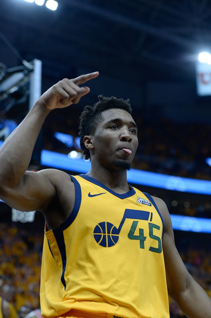 (Francisco Kjolseth | The Salt Lake Tribune) Utah Jazz guard Donovan Mitchell (45) celebrates a dunk against the Houston Rockets in Game 4 of the NBA playoffs at the Vivint Smart Home Arena Sunday, May 6, 2018 in Salt Lake City.