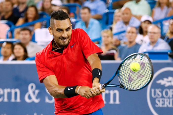 Nick Kyrgios, of Australia, returns to Rafael Nadal, of Spain, at the Western & Southern Open tennis tournament, Friday, Aug. 18, 2017, in Mason, Ohio. (AP Photo/John Minchillo)