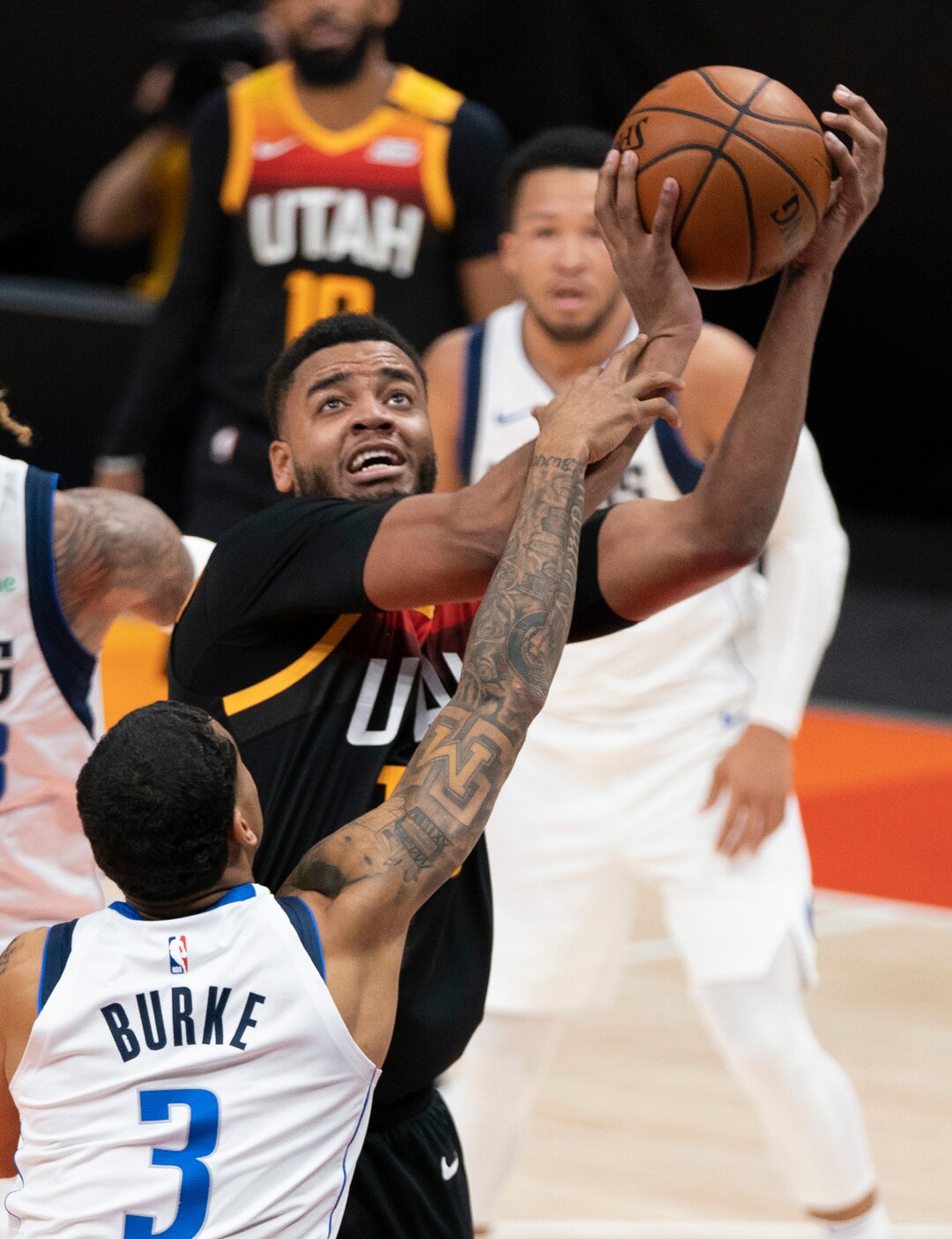 (Rick Egan | The Salt Lake Tribune) Dallas Mavericks guard Trey Burke (3) guards Utah Jazz forward Juwan Morgan (16), in NBA action between the Utah Jazz and the Dallas Mavericks at Vivint Arena, on Friday, Jan. 29, 2021.