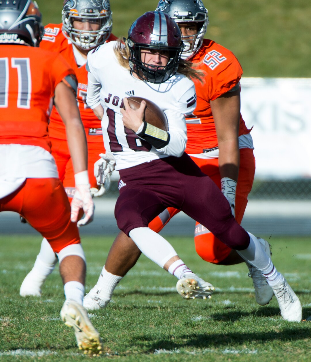 (Rick Egan  |  The Salt Lake Tribune)   Jordan quarterback Justin Bruderer runs with the ball, in prep 5A playoff action between Jordan High and Skyridge High, in Lehi, Friday, Nov. 2, 2018.
