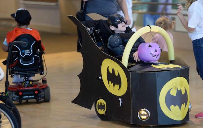 (Francisco Kjolseth  |  The Salt Lake Tribune)  Jeffrey Holder, 11, assumes his role as Batman as volunteers and staff at Shriners Hospital for Children in Salt Lake transform the wheelchairs of 28 patients for Halloween, Wednesday, Oct. 17, 2018.