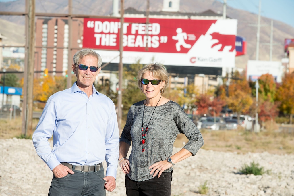 (Jeremy Harmon | The Salt Lake Tribune) Former Salt Lake City Mayor Ralph Becker and his wife, Kate Kopischke, seen here on 600 South in Salt Lake City on Oct. 26, 2018, have started a local affiliate of Scenic America to press for more regulation and less proliferation of billboards. “Here we have the most prominent gateway into our city coming in on 6th South," Becker said. "It is lined all the way into the city with billboards. It detracts from what would otherwise be a beautiful gateway into Salt Lake.” He calls the towering rows of signs an "embarrassing blight.”