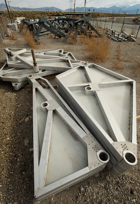 Rick Egan | The Salt Lake Tribune
The Hoberman Arch, one of the symbols of the 2002 Winter Games, sits among the weeds in Salt Lake City's impound lot, Wednesday, November 12, 2014