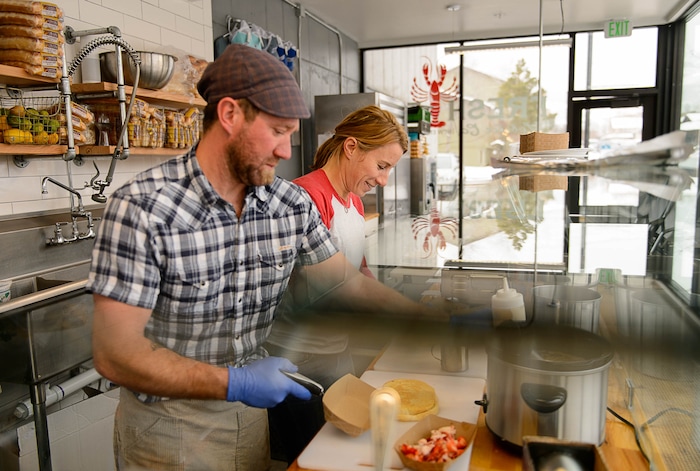 (Trent Nelson | The Salt Lake Tribune) Dale Hentzell and Lorin Smaha at work at Freshie's Lobster Co. in Park City.