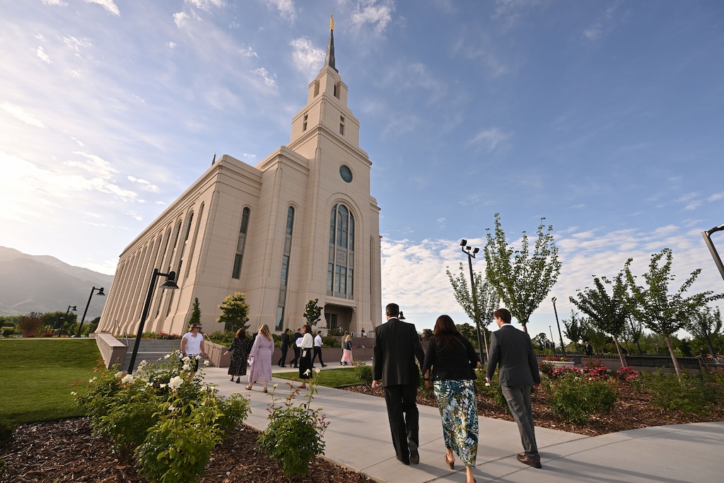 (The Church of Jesus Christ of Latter-day Saints) Latter-day Saints attending the dedication make their way into the Layton Utah Temple before its dedication by apostle David A. Bednar on Sunday, June 16, 2024.