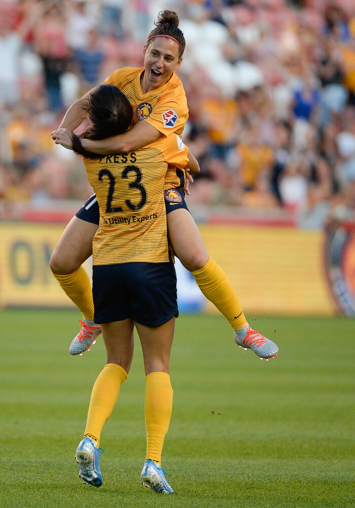 (Francisco Kjolseth  |  The Salt Lake Tribune)  Utah Royals FC forward Christen Press (23) is celebrated after scoring the first goal of the night as Utah Royals FC hosts the North Carolina Courage at Rio Tinto Stadium in Sandy, Utah on Saturday, July 27, 2019.
