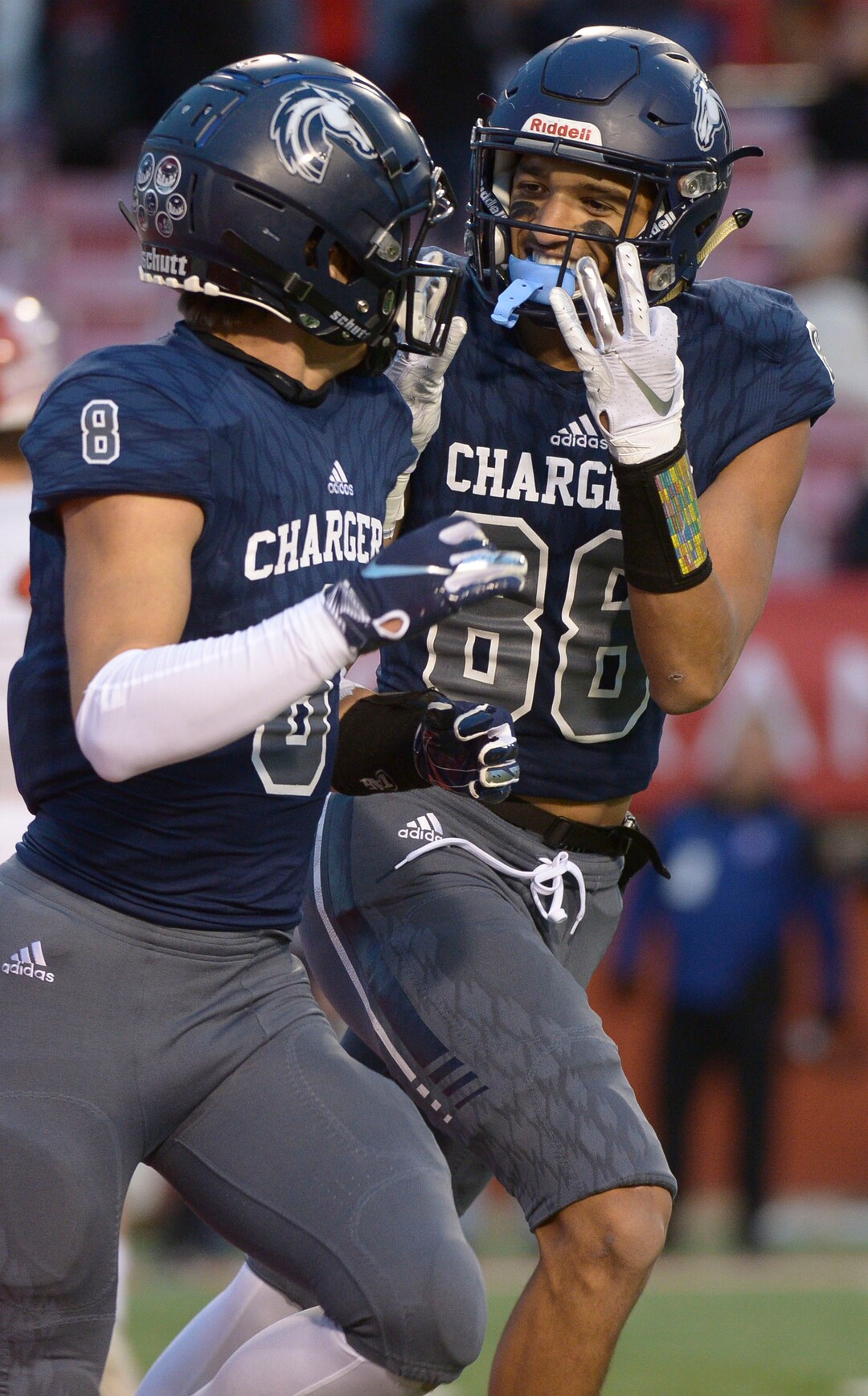 (Leah Hogsten  |  The Salt Lake Tribune) Corner CanyonÕs Kobe Peters celebrates Noah KjarÕs touchdown.  Corner Canyon High School defeated American Fork High School 49-14 during the 6A State Championship football title, Nov. 22, 2019 at Rice-Eccles Stadium.