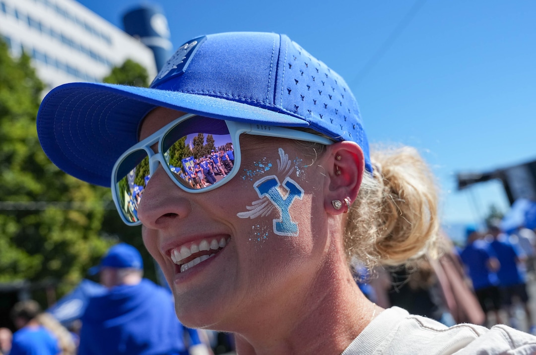 (Francisco Kjolseth | The Salt Lake Tribune) Marla Grover lines up for the “Cougar Walk” as BYU arrives for their game against Utah Tech at LaVell Edwards Stadium in Provo on Saturday, Sept. 5, 2026. 