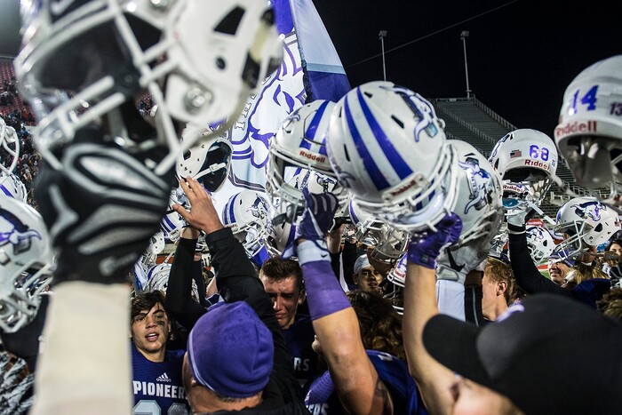 (Chris Detrick  |  The Salt Lake Tribune)  Members of the Lehi football team celebrate after winning the Class 5A state title game at Rice-Eccles Stadium Friday, November 17, 2017.   Lehi defeated Skyridge 55-17.