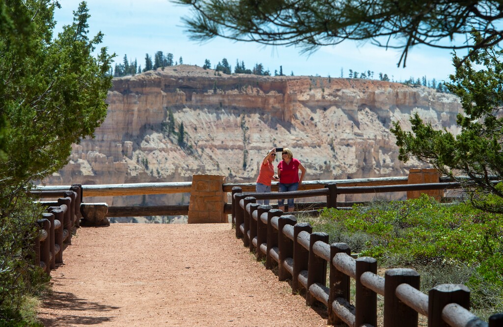 (Rick Egan  |  The Salt Lake Tribune)    Alese Rhodes from Tri-cities Washington State, and Debbie Schorzman, Portland Oregon, take a selfie at Sunset Point, in the in a nearly empty Bryce Canyon National Park, Wednesday May 6, 2020