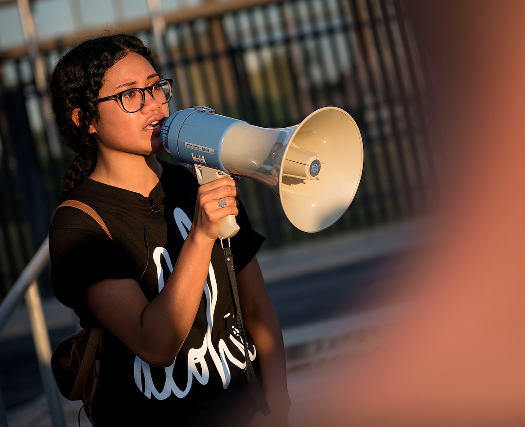 Michael Mangum  |  Special to the TribuneSaane Siale, 22, of Oakland, CA, speaks during a protest outside the U.S. Immigration and Customs Enforcement Salt Lake City Field Office in West Valley City, UT on Wednesday, July 24, 2019.