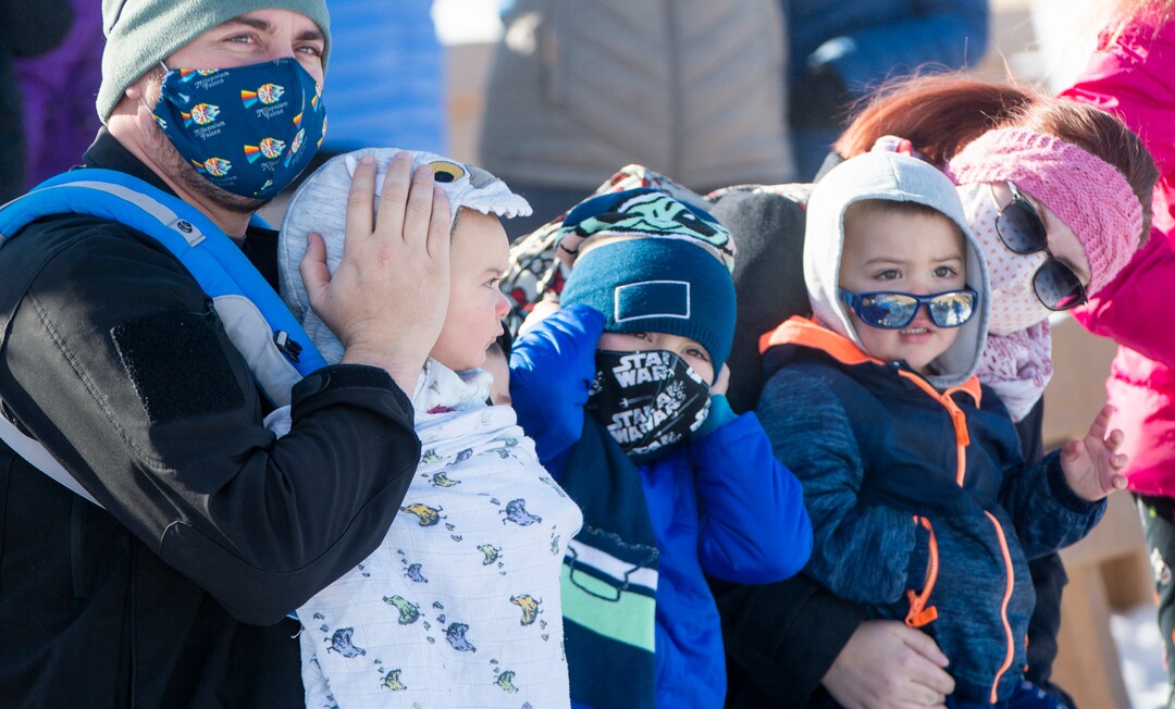 (Rick Egan | The Salt Lake Tribune) Visitors cover their ears as Steam Engine 119 blows it's whistle, at the Golden Spike National Historical Park during one a winter steam locomotive demonstration, on Tuesday, Dec. 29, 2020.