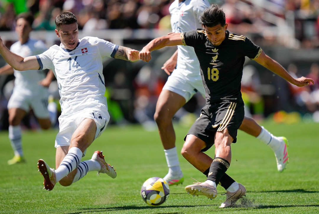 (Francisco Kjolseth  | The Salt Lake Tribune) Cédric Zesiger, 14, of Switzerland battles Ángel Sepúlveda, 18, of Mexico for possession as the Mexico Men’s National Team takes on Switzerland in a MexTour match at Rice-Eccles Stadium on Saturday, June 7, 2025.