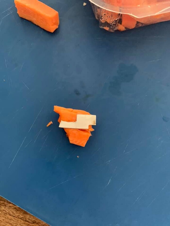(Photo courtesy of Amber Choruby Whiteley) A Salt Lake City woman found a piece of a metal blade lodged in a pre-cut carrot stick she was eating on Jan. 20, 2020. Harmons grocery said a mechanical failure was to blame and issued a recall for some of the carrot sticks sold at its City Creek location.