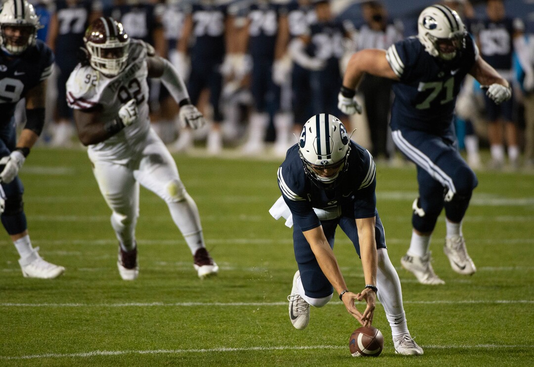 (Francisco Kjolseth  |  The Salt Lake Tribune) Brigham Young Cougars quarterback Zach Wilson (1) fumbles a snap recovered by Texas State near the end zone before the defensive lineup was able to stop any attempts at a touchdown by Texas State during an NCAA college football game at LavVell Edwards Stadium, Saturday, oct. 24, 2020, in Provo, Utah.
