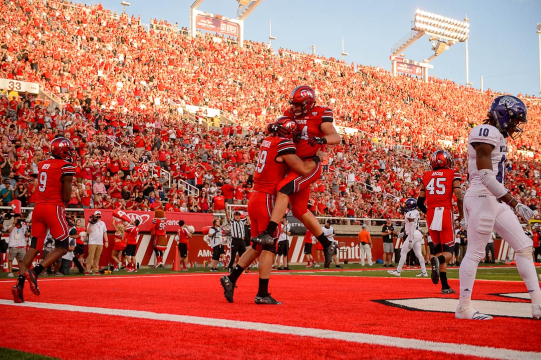 (Trent Nelson | The Salt Lake Tribune)  Utah Utes tight end Jake Jackson (44) and Utah Utes tight end Cole Fotheringham (89) celebrate a first half touchdown as the University of Utah Utes host the Weber State Wildcats, Thursday Aug. 30, 2018 at Rice-Eccles Stadium in Salt Lake City.