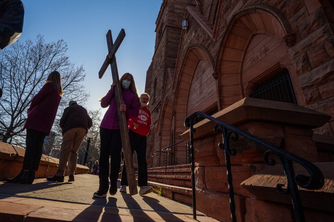 (Trent Nelson  |  The Salt Lake Tribune) A Good Friday procession stops at the First Presbyterian Church in Salt Lake City on Friday, April 15, 2022.